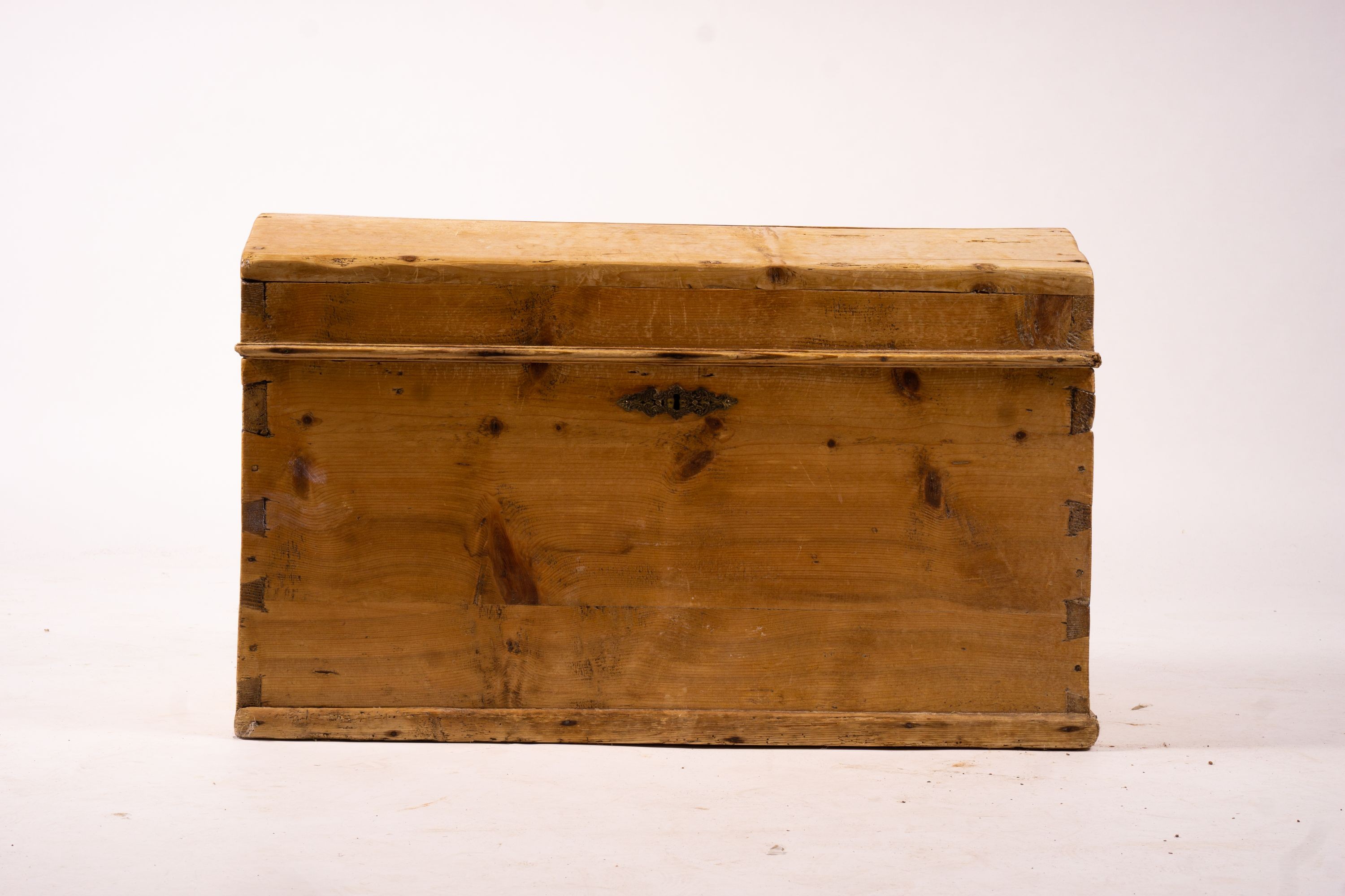 A small 19th century Continental pine domed top trunk, length 74cm, width 40cm, height 46cm